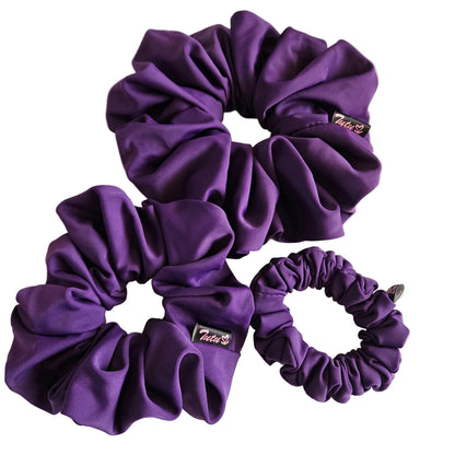 Three plum lycra swim scrunchies 