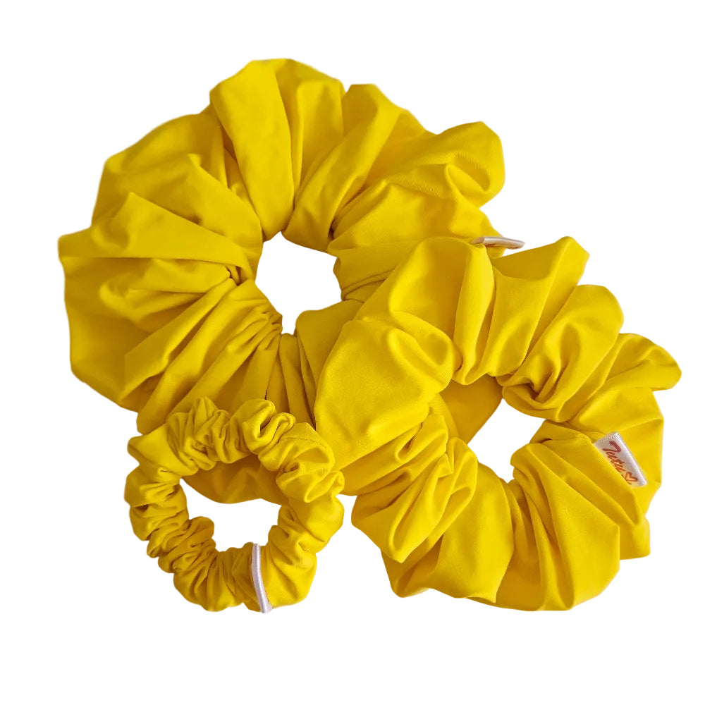 Three yellow lycra swim scrunchies