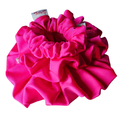 Fluorescent pink lycras swim scrunchies stack